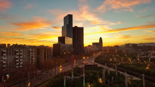 High angle view of city at sunset