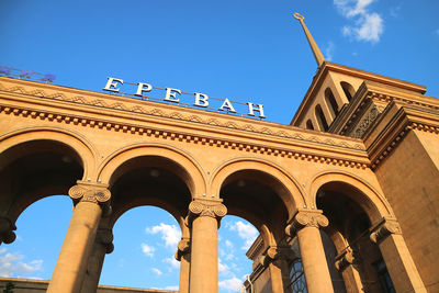 Low angle view of historical building against blue sky