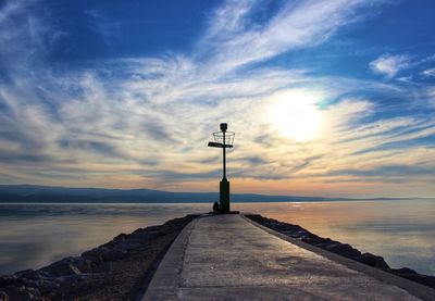 Scenic view of sea against sky at sunset