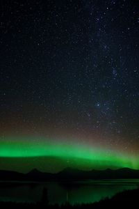 Scenic view of lake against star field at night