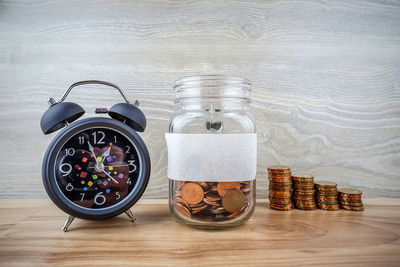 Close-up of coins on table