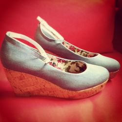 Close-up of shoes on table