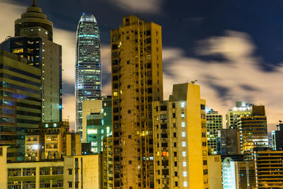 Modern buildings in city at night