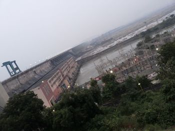 High angle view of dam against clear sky at dusk