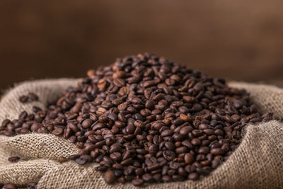 Close-up of coffee beans in sack