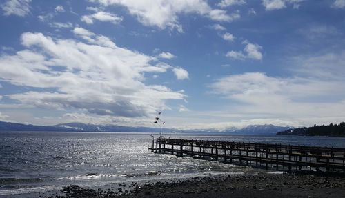 Pier over sea against sky