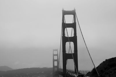 Suspension bridge in foggy weather
