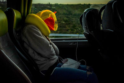 People sitting in car