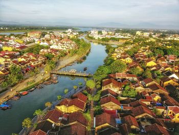 High angle view of river amidst buildings in city