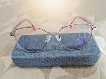 Close-up of eyeglasses on table