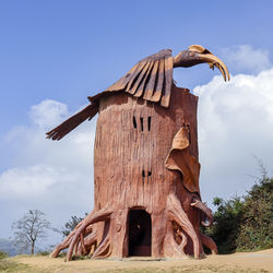 Low angle view of sculpture against sky