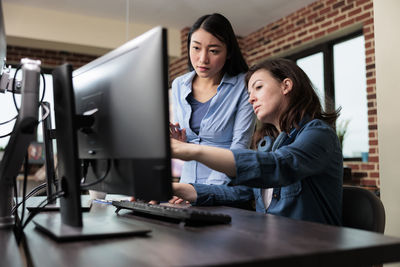 Business colleagues working at office