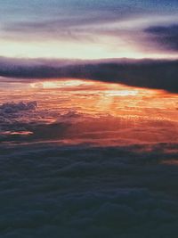 Scenic view of dramatic sky at sunset