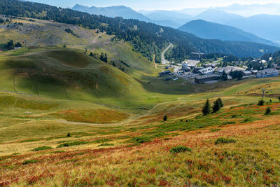 Scenic view of landscape and mountains against sky