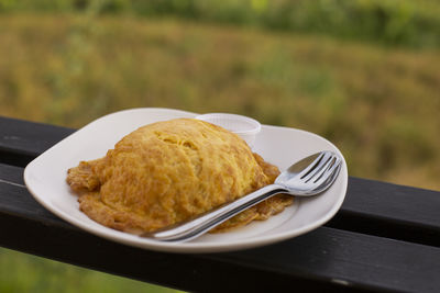 Close-up of breakfast served on table