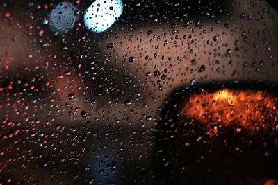 Close-up of raindrops on window