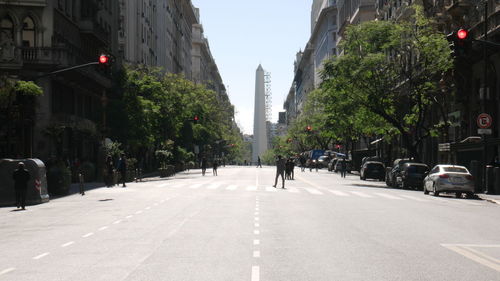 Road amidst buildings in city