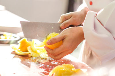 Close-up of person preparing food