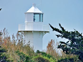 Low angle view of lighthouse against clear sky