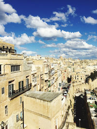 High angle view of buildings against sky