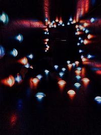 Close-up of illuminated lights at night