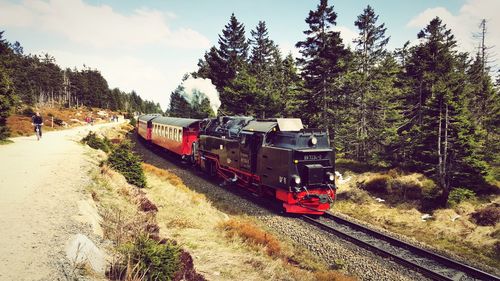 Steam train moving by road