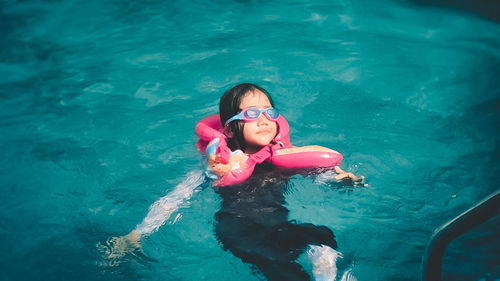 Portrait of girl in swimming pool