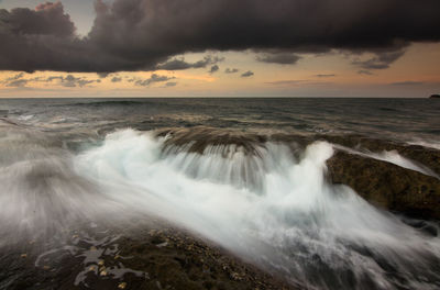 Scenic view of sea against sky during sunset