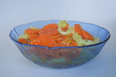 Close-up of food served on table against white background