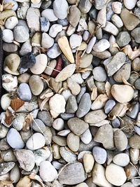 Full frame shot of pebbles on beach