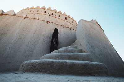 Low angle view of old building against sky