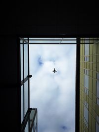 Low angle view of train against sky