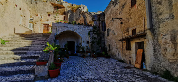 Alley amidst buildings in city