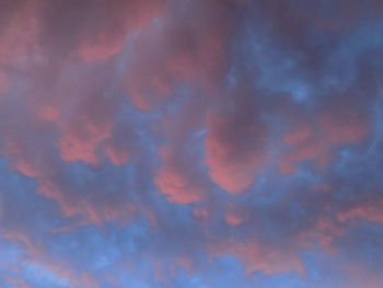 Abstract image of illuminated lights against sky at night