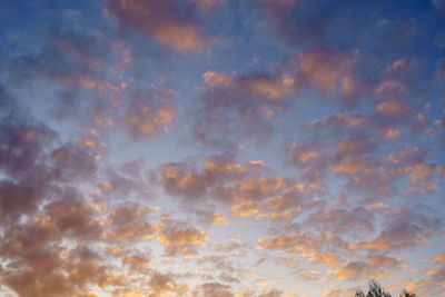 Low angle view of dramatic sky during sunset