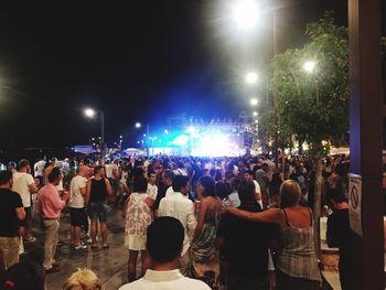 Crowd at music concert at night