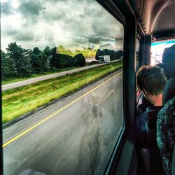 View of road through train window