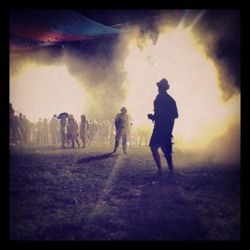 Group of people walking on foggy weather