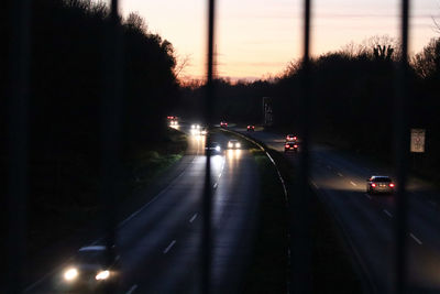 Cars on road at night