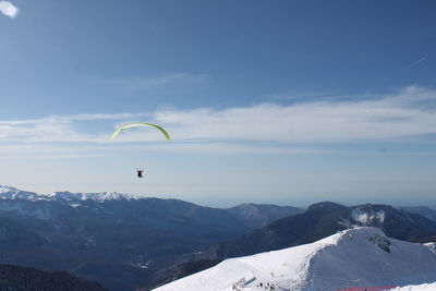 Scenic view of snowcapped mountain against sky