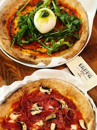 Close-up of pizza served on table