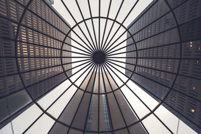 Directly below shot of modern buildings seen through skylight