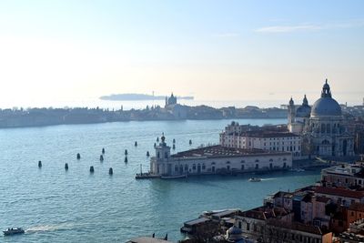 View of buildings in city at waterfront