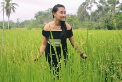 Young woman in rice field