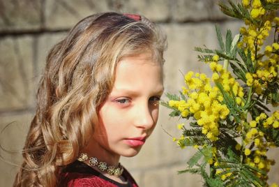 Portrait of woman with  flower