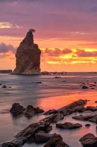 Scenic view of sea against sky at sunset