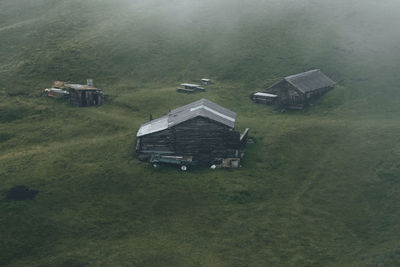 High angle view of houses on field