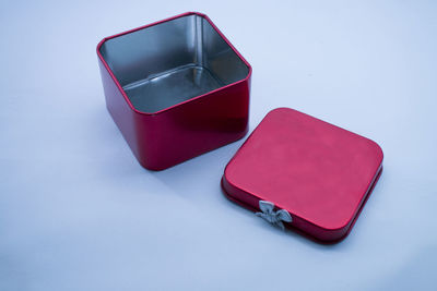 Close-up of eyeglasses on table against white background