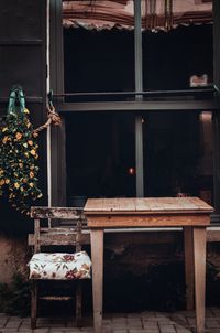 Chairs and tables in a window of a building