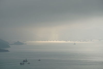 Scenic view of sea against sky during winter